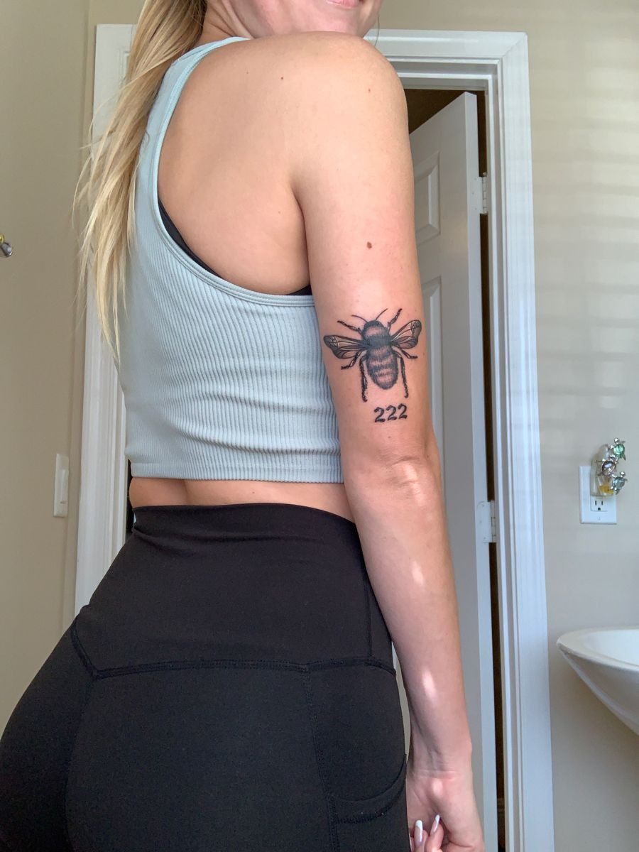 Bee with 222 Tattoo, a tattoo design rendered in clean detailed linework for the arm.
