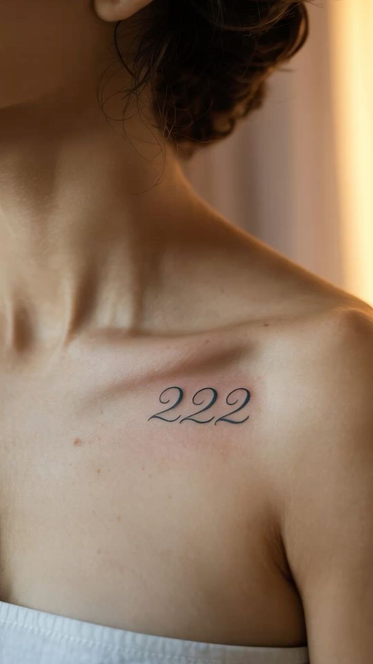 Likely a Delicate Sheer Collarbone 222, a tattoo design rendered in delicate fine-line.
