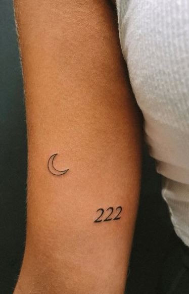 Minimal Crescent Moon with 222, a tattoo design rendered in bold for the leg.