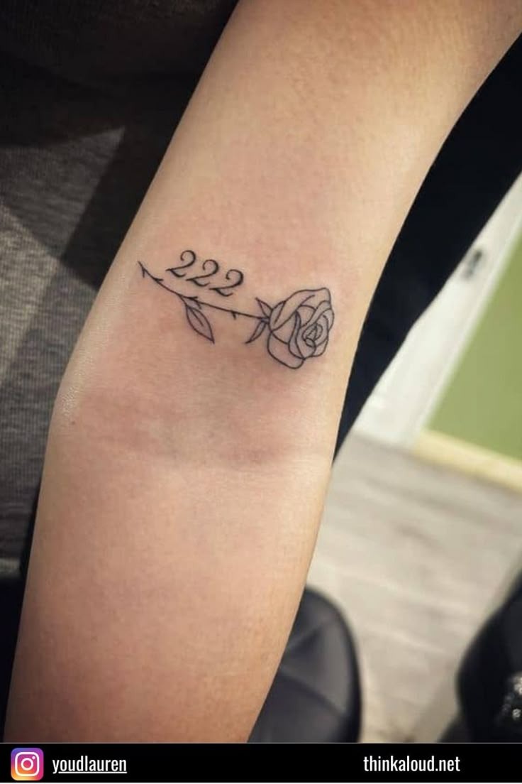 Rose Stem with 222, a tattoo design rendered in clean detailed linework.