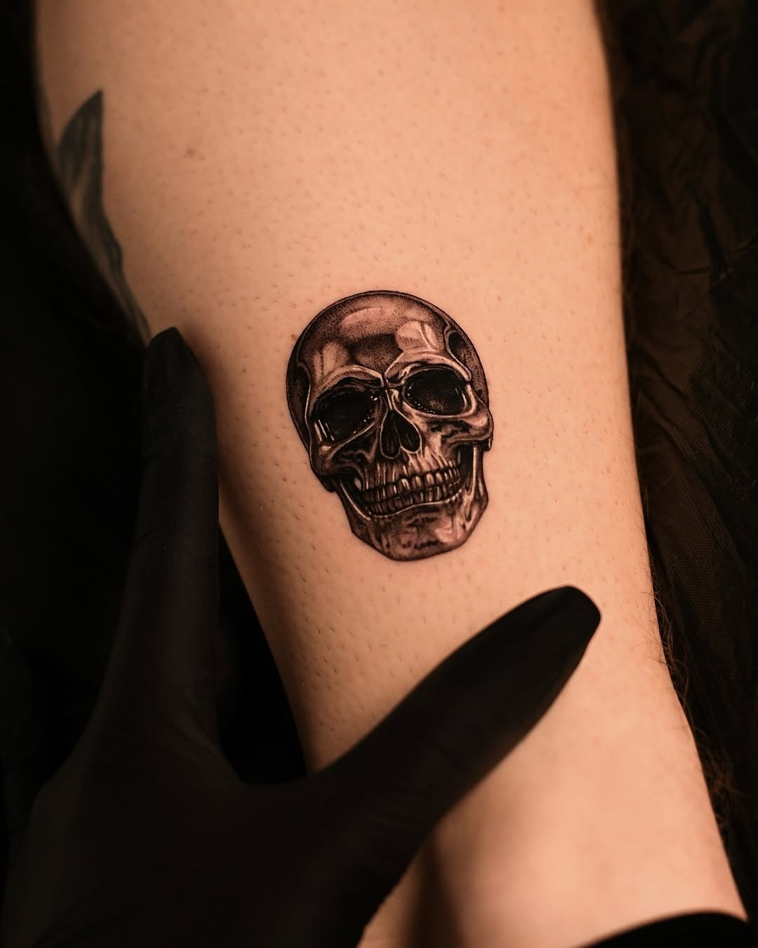 Intricate 3D skull tattoo design on arm Tattoo Design