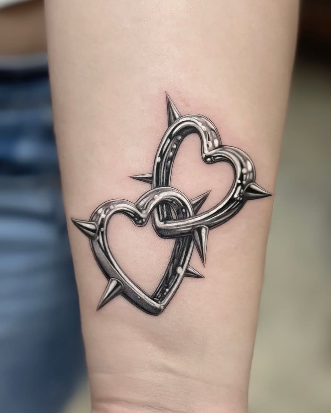 Intricate spiked hearts tattoo bursting with detail Tattoo Design