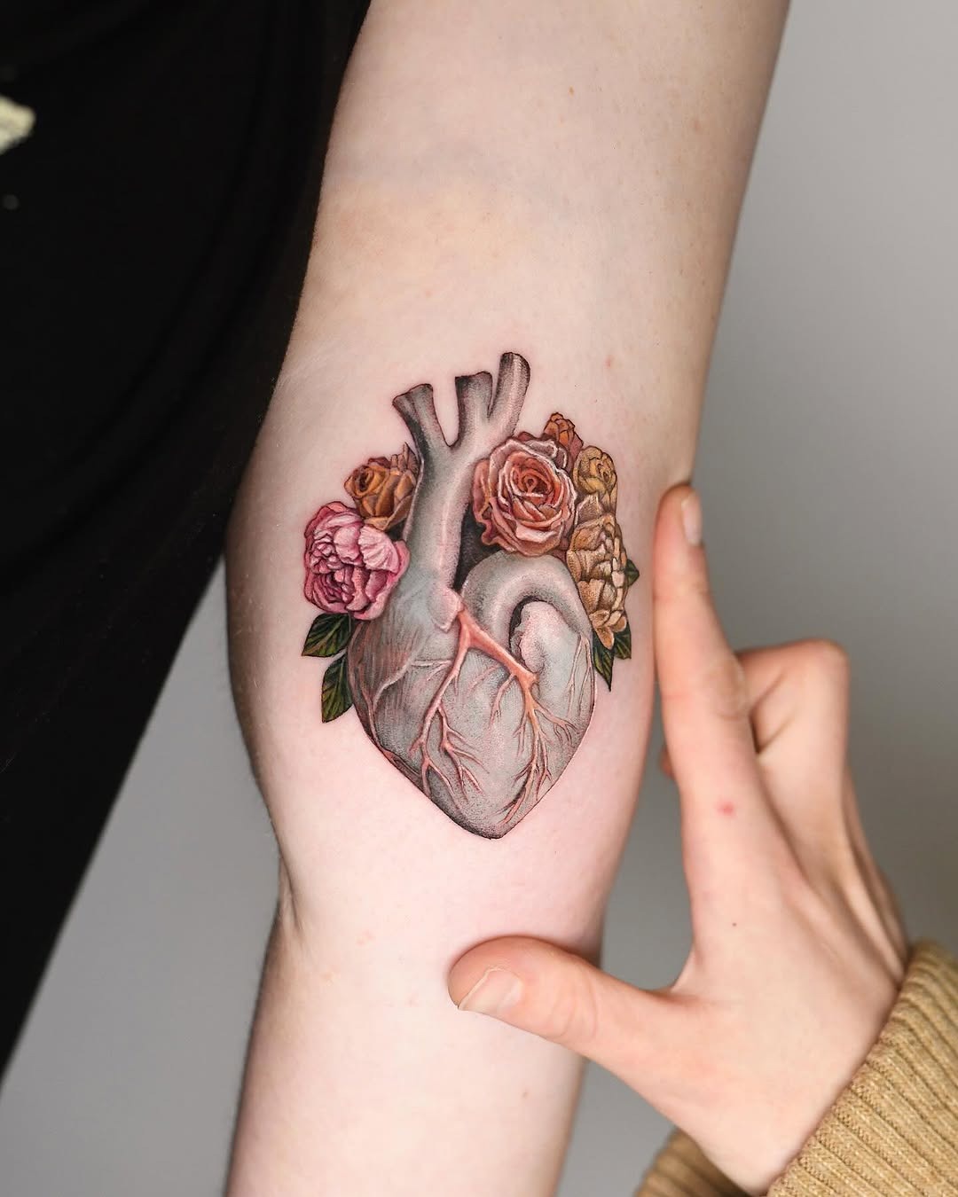 Stunning 3D heart tattoo with floral elements Tattoo Design