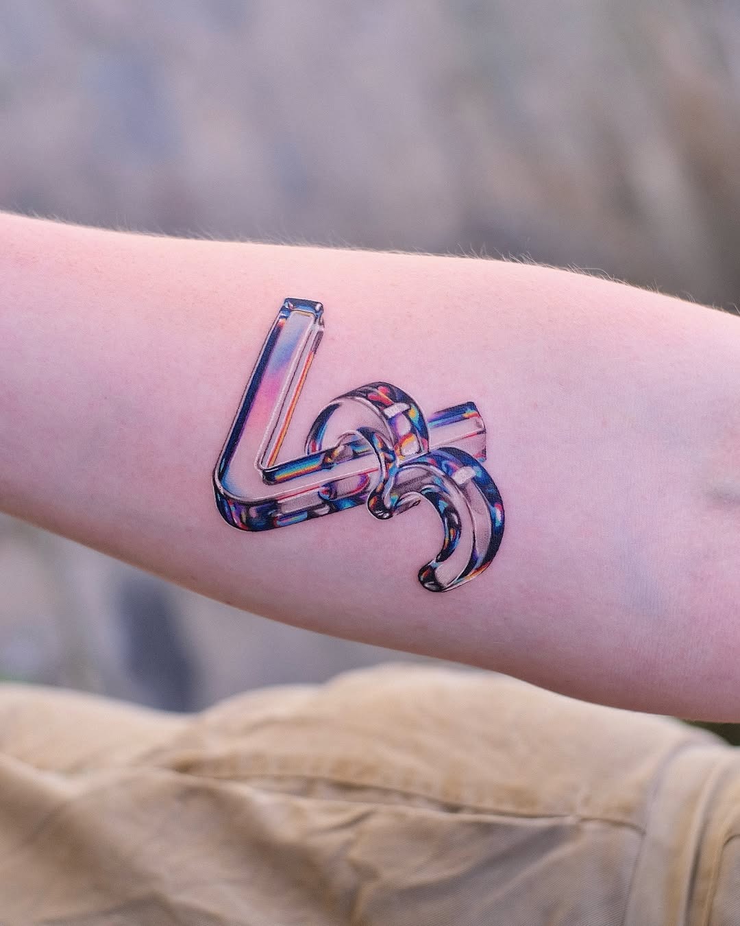 Vibrant 3D Tattoo with Dynamic Curves Tattoo Design