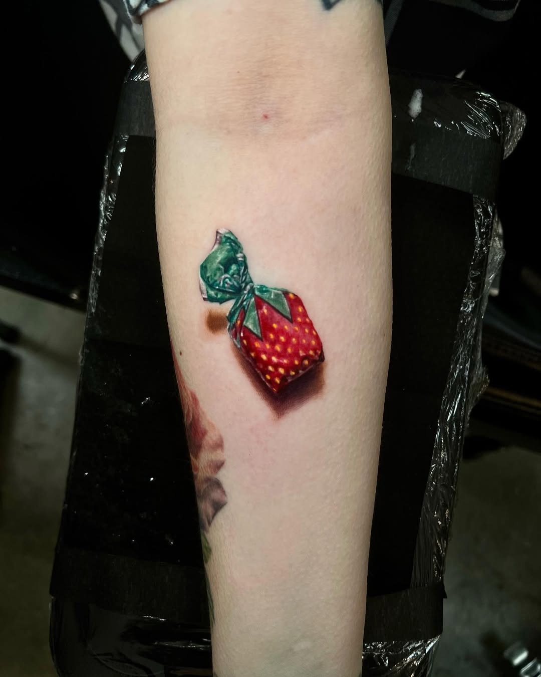 Whimsical 3D Strawberry Gift Tattoo Tattoo Design
