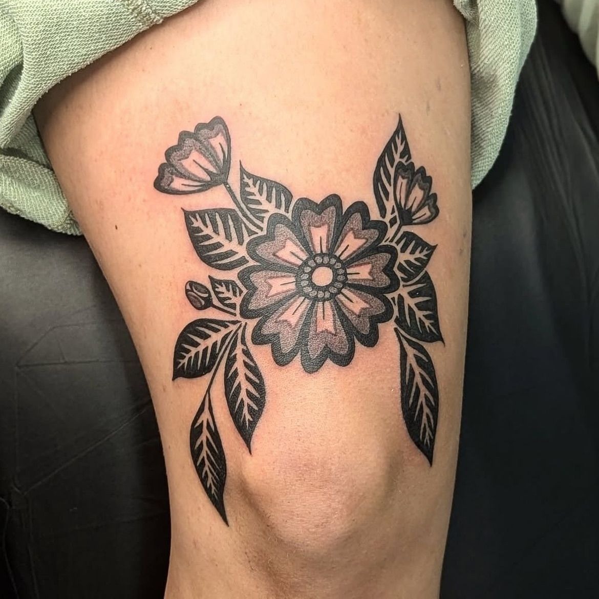 Bold Floral Bouquet With Butterfly Accents Tattoo Design