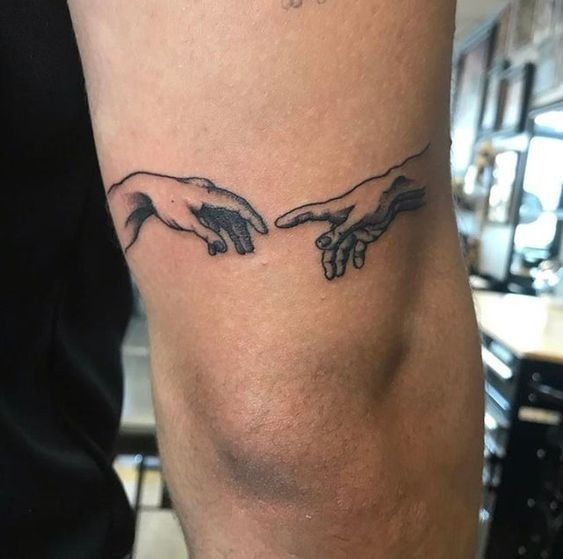 Minimal “Hands Reaching” Fine-Line Art Tattoo Design