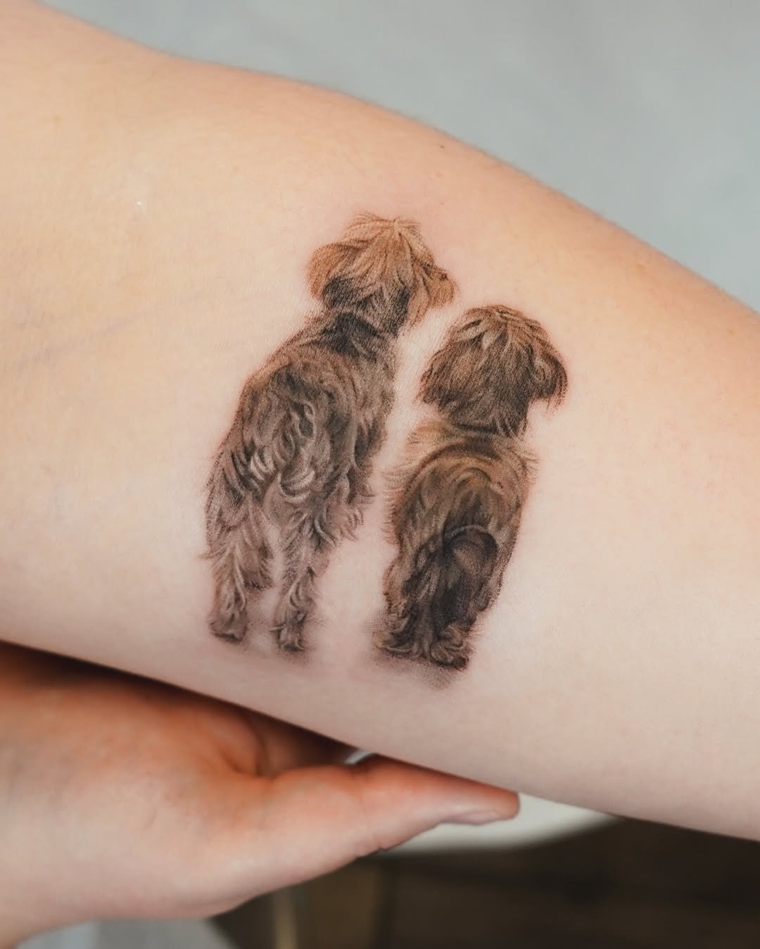 Beautiful dog and hand tattoo design Tattoo Design