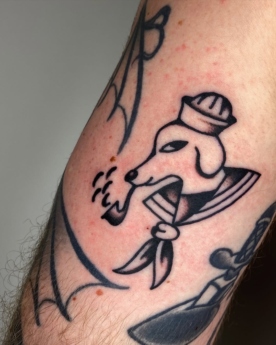 Sailor Dog Tattoo with a Playful Twist Tattoo Design