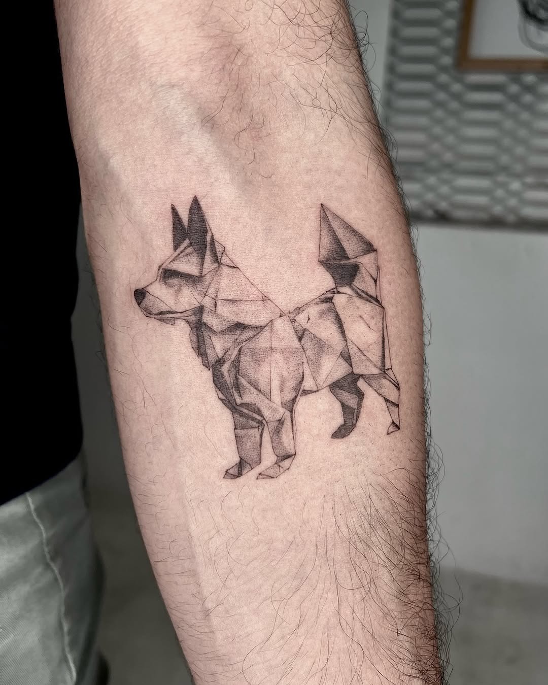 Stylish geometric dog tattoo with sharp lines Tattoo Design