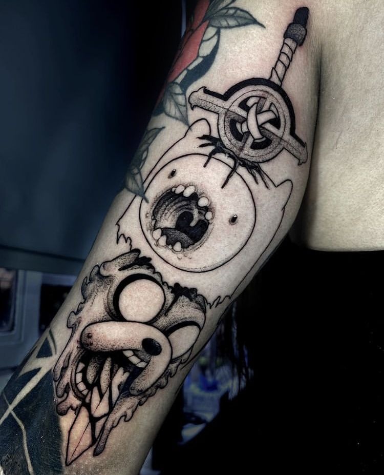 Finn & Jake Dark Surreal Forearm Piece Tattoo Design