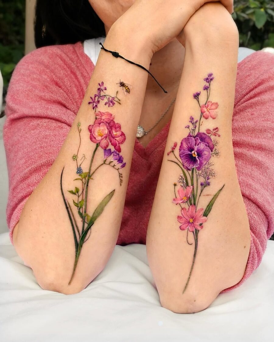 These stunning floral tattoos showcase intricate designs of blooming flowers in colors.