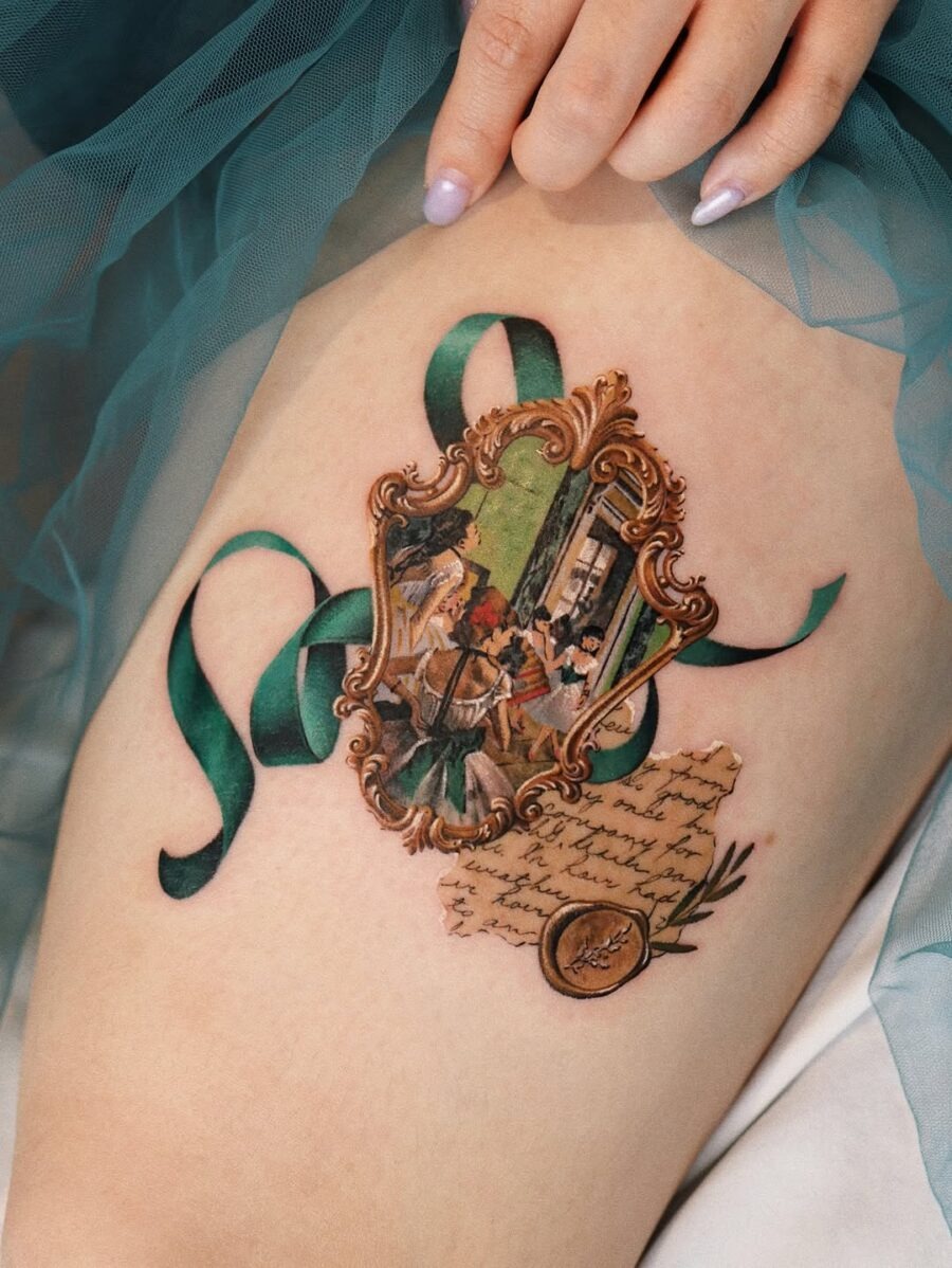 This tattoo blends vintage elements with a touch of artistry.