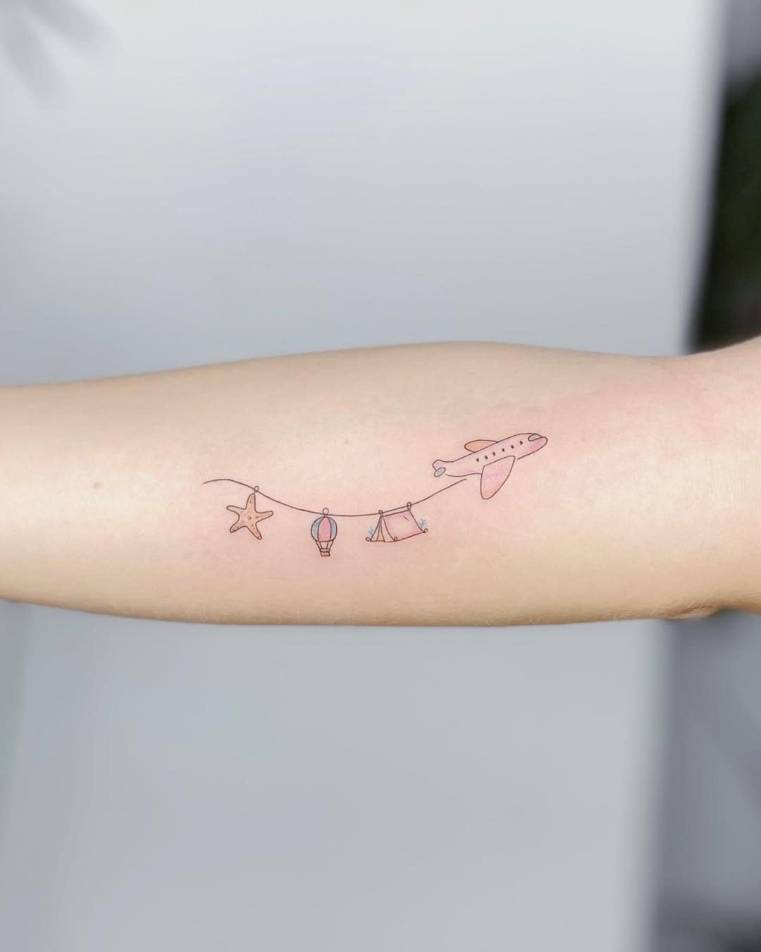 Charming airplane tattoo with nostalgic vibes Tattoo Design