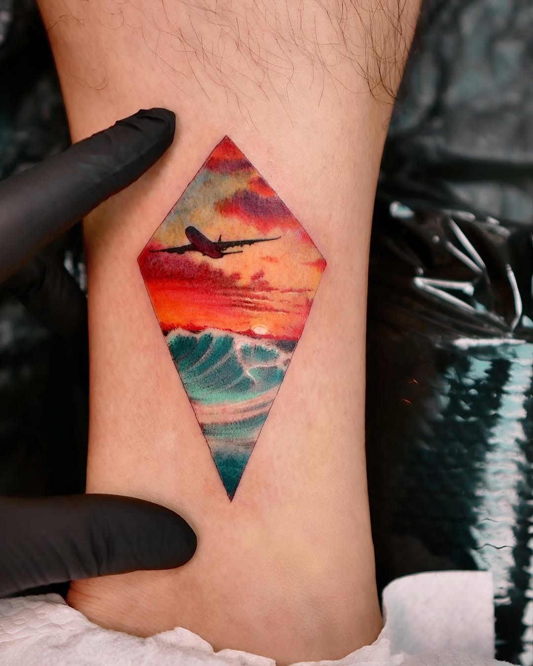 Stunning airplane tattoo with sunset vibes Tattoo Design
