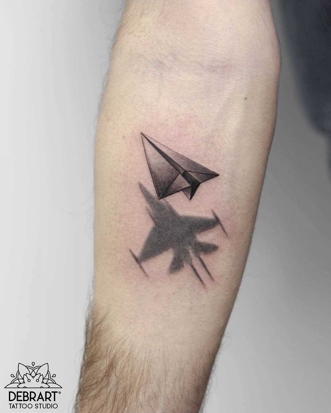 Unique jet and paper plane tattoo design Tattoo Design