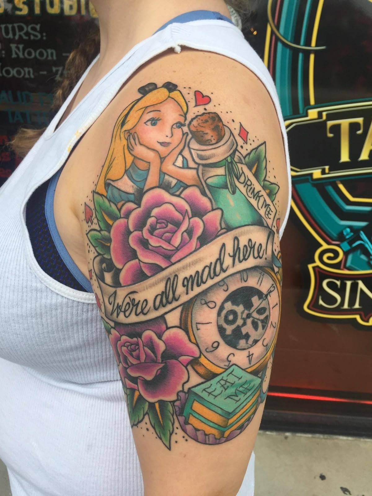 Traditional Sleeve With alice, Quotes, And Flowers Tattoo Design