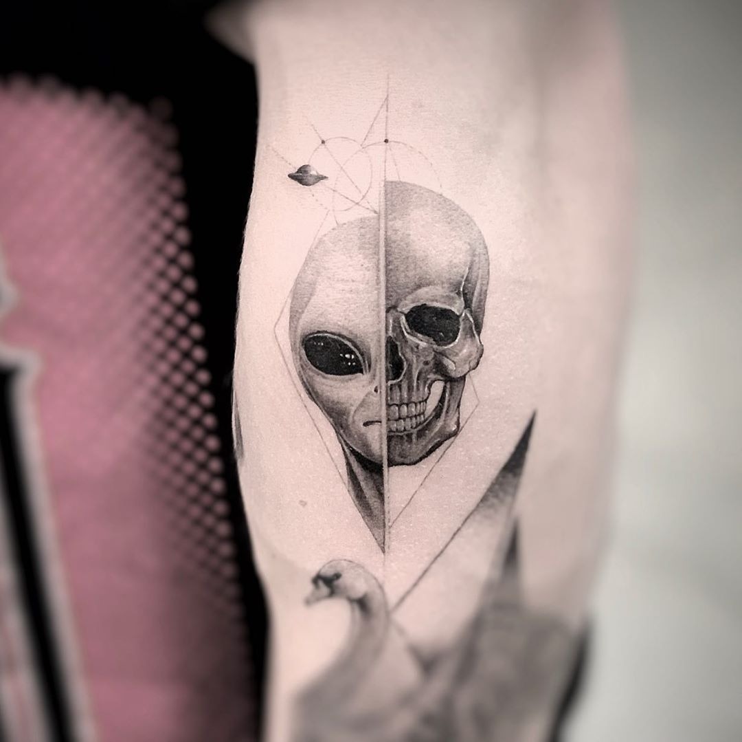Alien and Skull Split Face Tattoo, a tattoo design rendered in clean detailed linework.