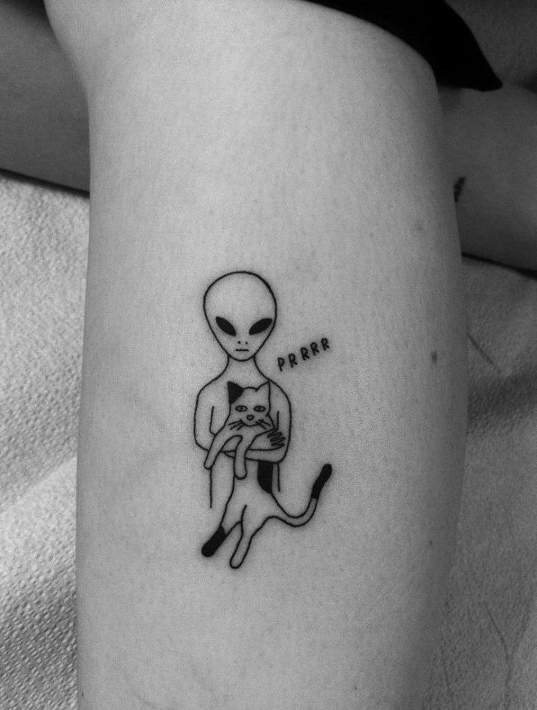 Alien Holding Cat Tattoo (Minimalist Style), a tattoo design rendered in minimalist fine-line.