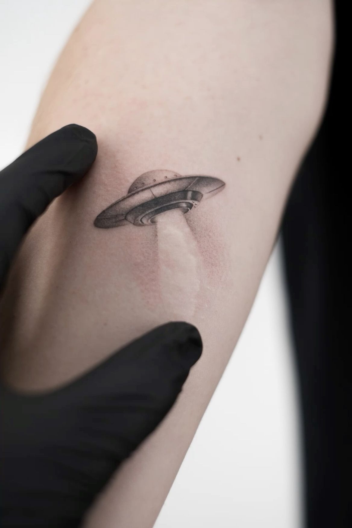 Mini UFO Beam Tattoo, a tattoo design rendered in clean detailed linework.