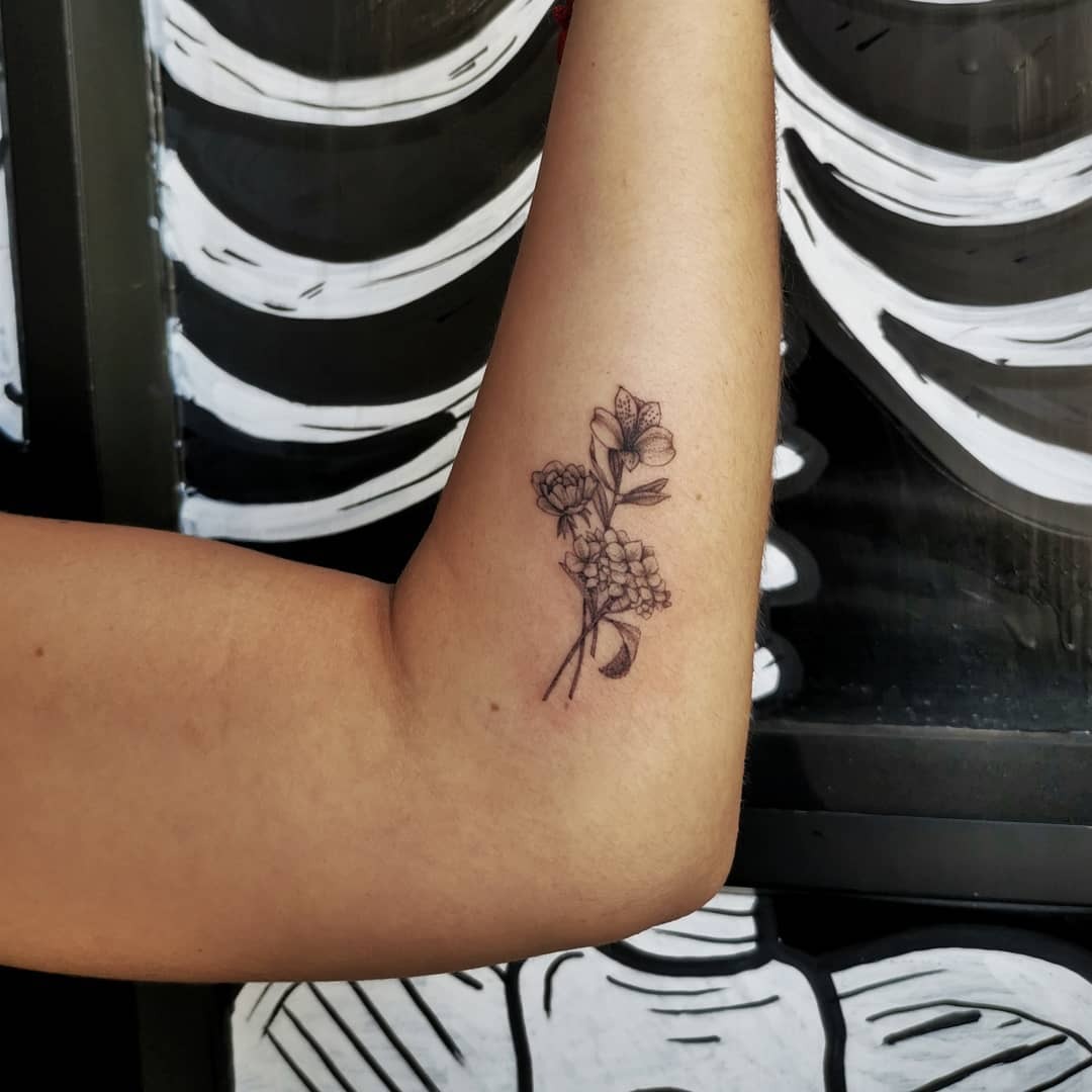 Elegant alstroemeria tattoo on a forearm Tattoo Design