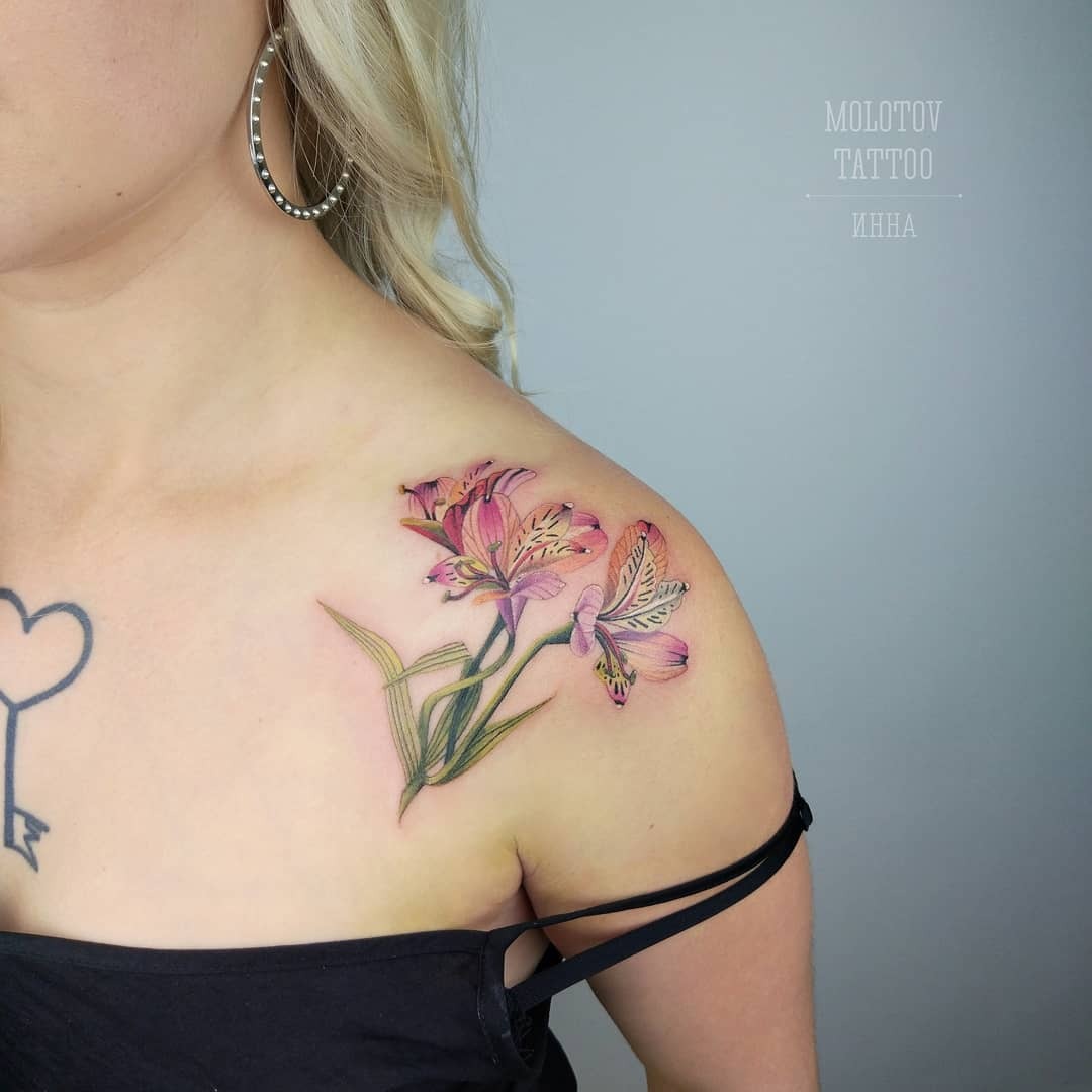 Vibrant alstroemeria tattoo on shoulder Tattoo Design