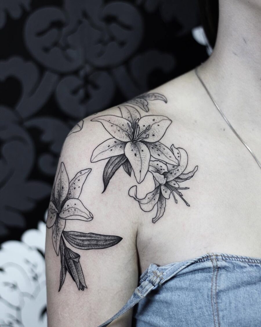 Elegant amaryllis tattoo blending femininity and style Tattoo Design