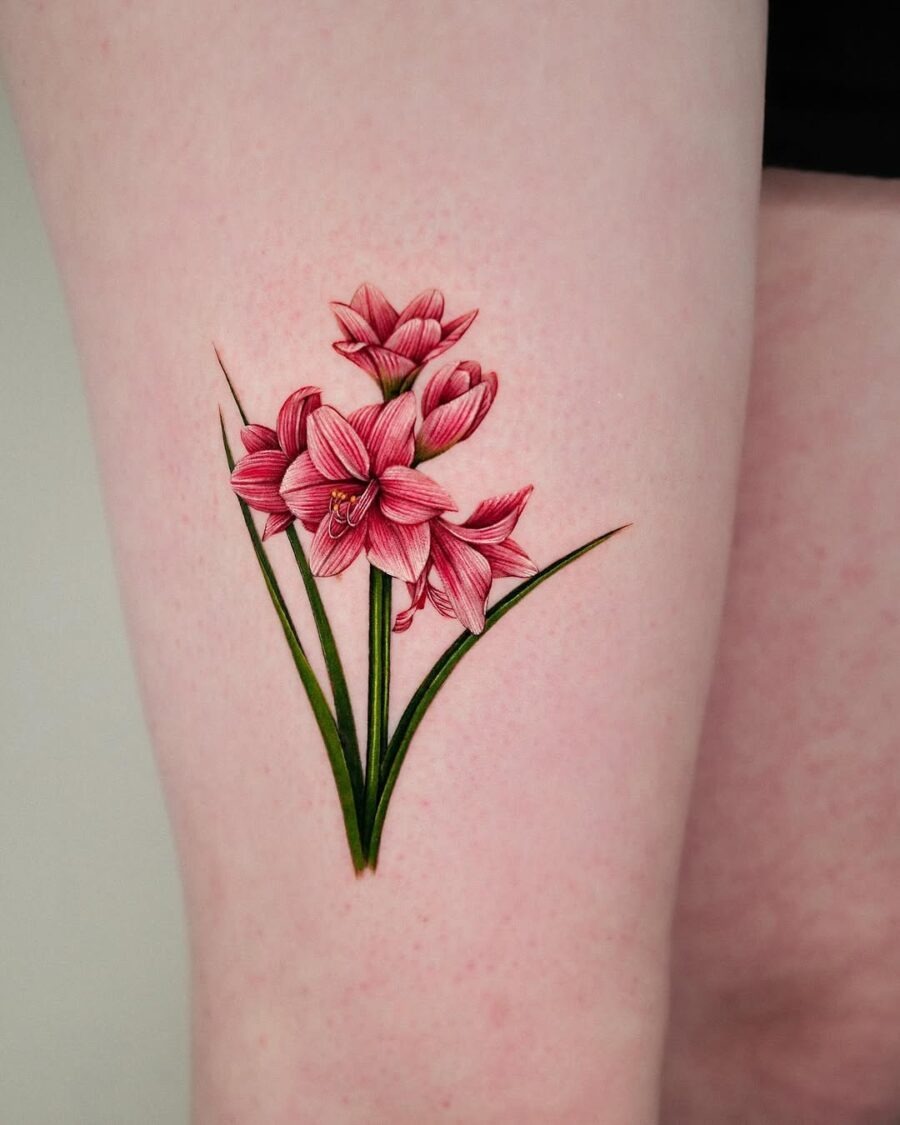 Vibrant amaryllis tattoo showcasing floral artistry Tattoo Design