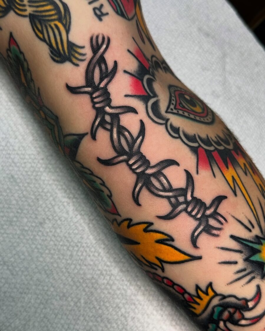 Bold barbed wire tattoo symbolizing resilience Tattoo Design
