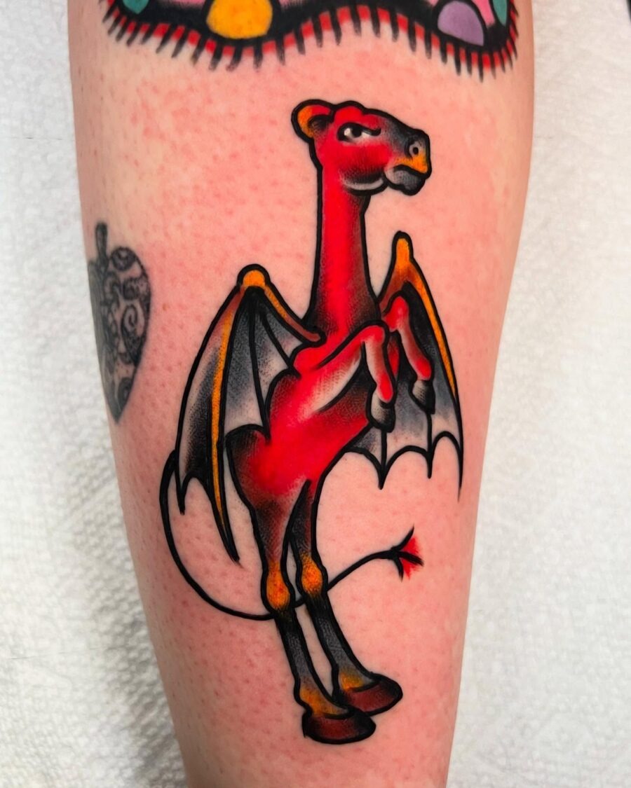 Bold red dragon tattoo with playful vibes Tattoo Design