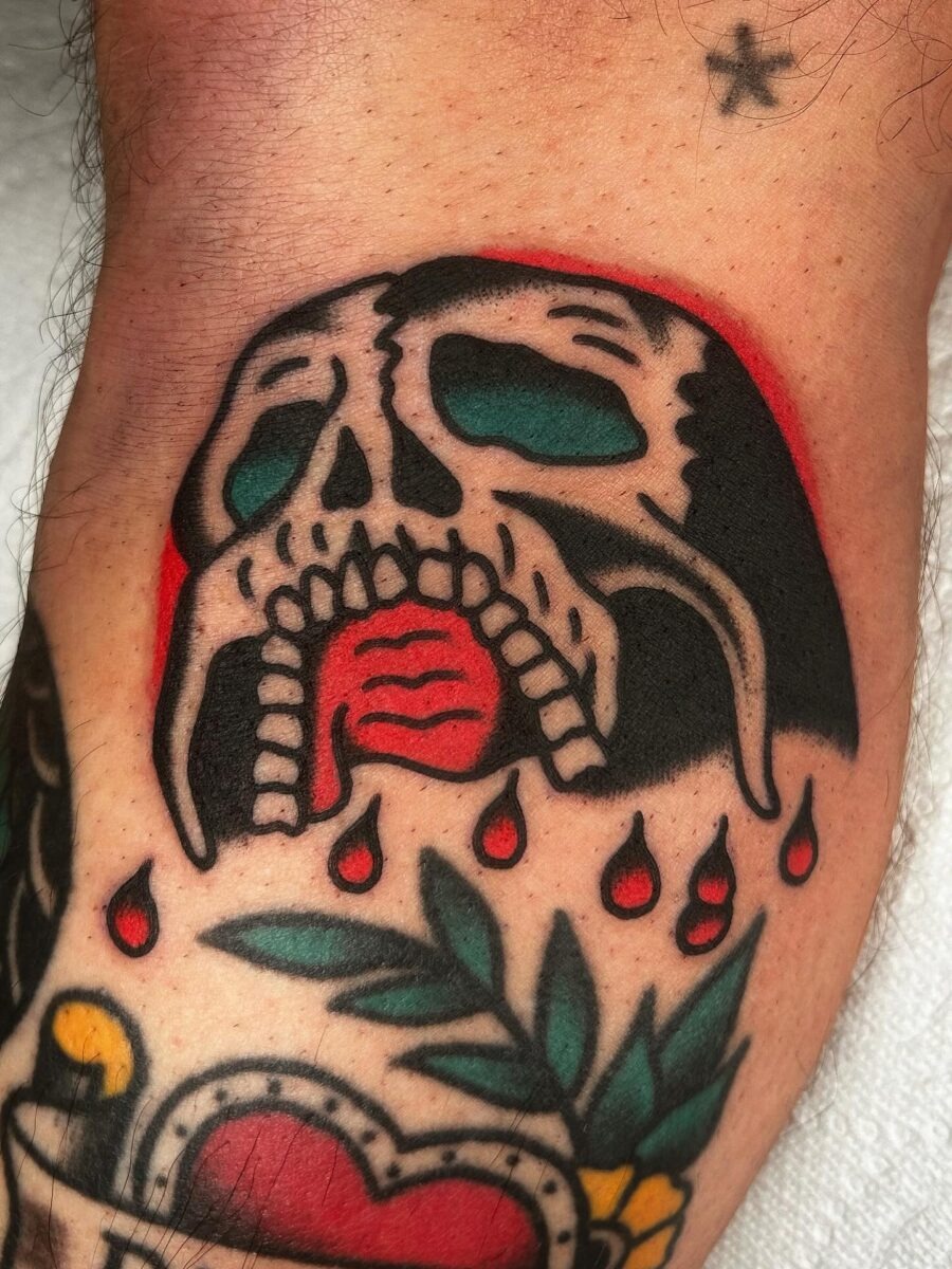 Bold skull tattoo with dripping details Tattoo Design