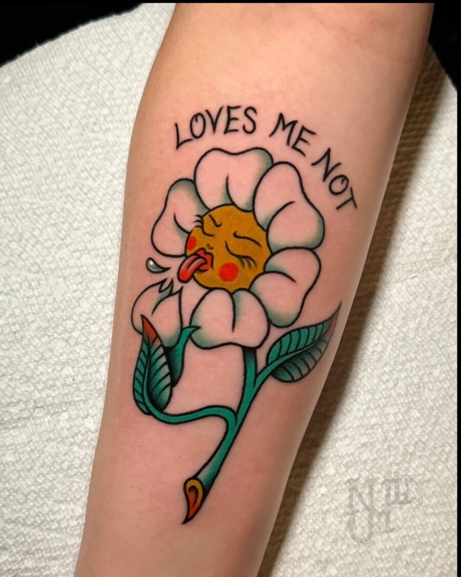 Charming floral tattoo with playful expression Tattoo Design