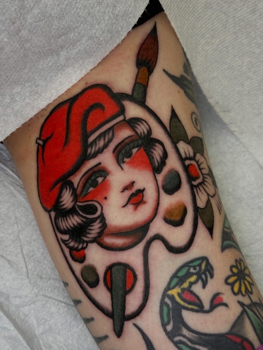 Colorful palette girl tattoo showcasing artistic spirit Tattoo Design