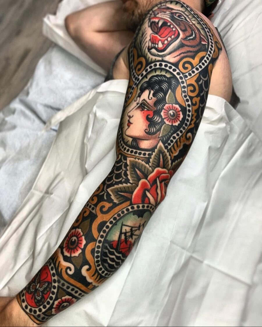 Intricate full sleeve tattoo showcasing Americana style Tattoo Design