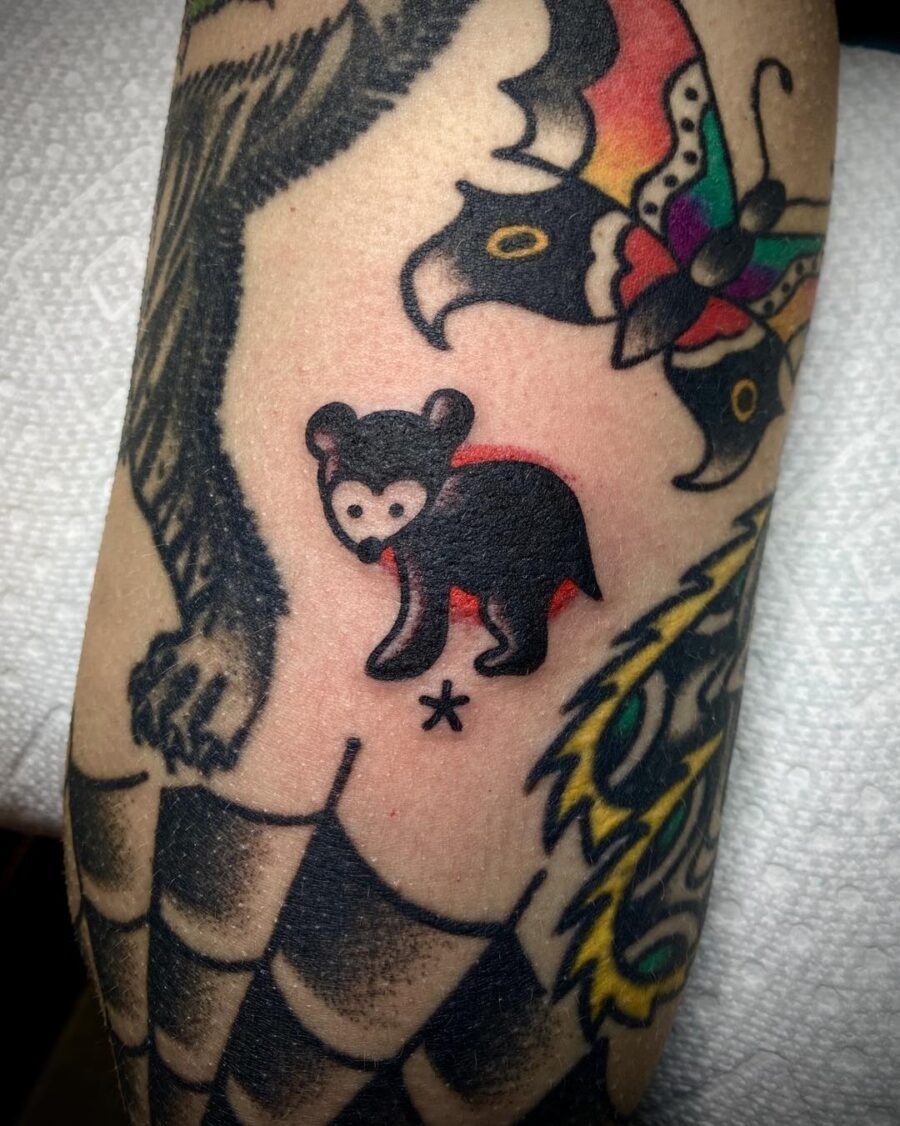 Playful bear tattoo in Americana style Tattoo Design