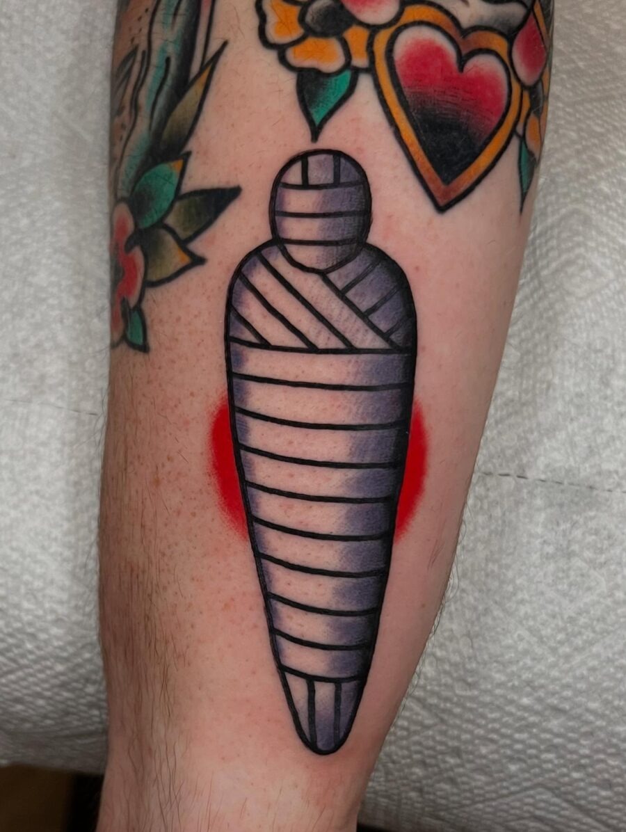 Unique vintage mummy tattoo with bold lines Tattoo Design