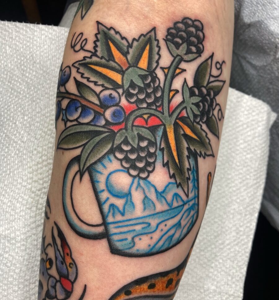 Vibrant Americana Mug Tattoo with Berries Tattoo Design