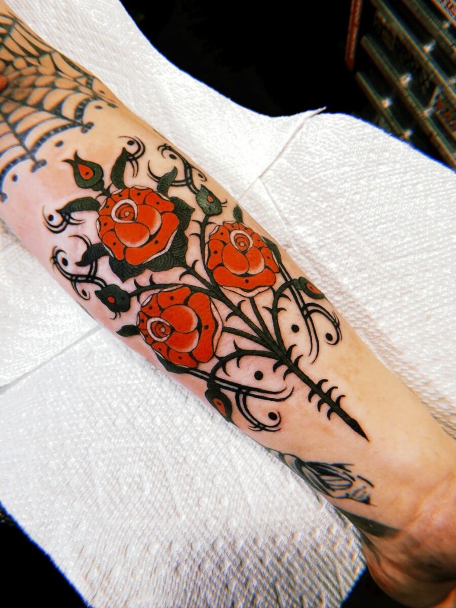 Vibrant Americana roses with intricate designs Tattoo Design