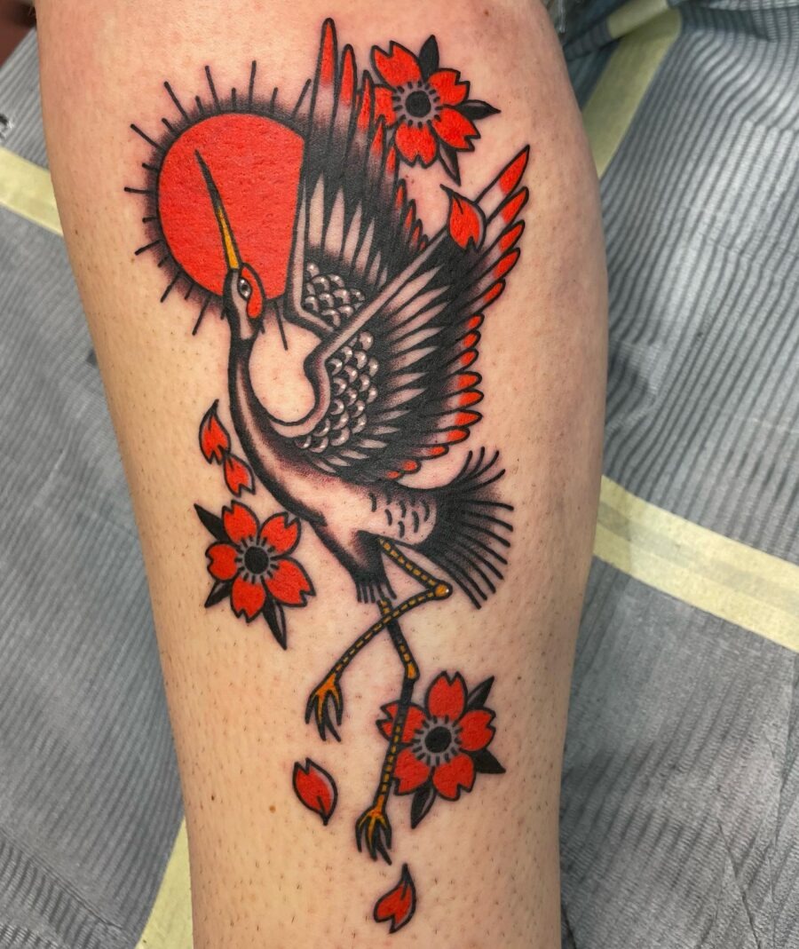 Vibrant crane tattoo with floral elements Tattoo Design