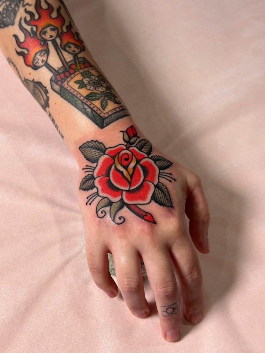 Vibrant red rose in classic Americana style Tattoo Design