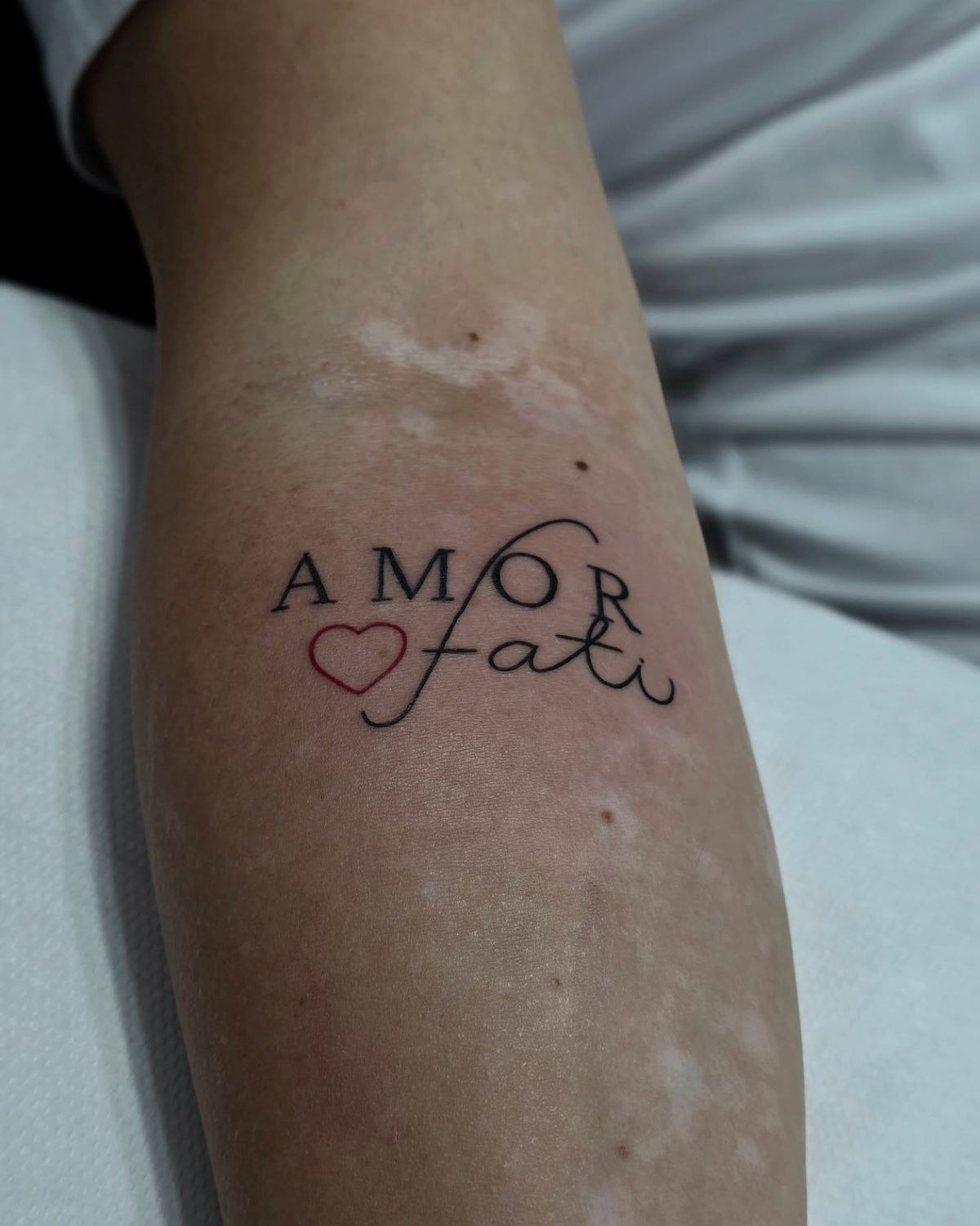 Amor Fati Tattoo with Red Heart Accent Tattoo Design