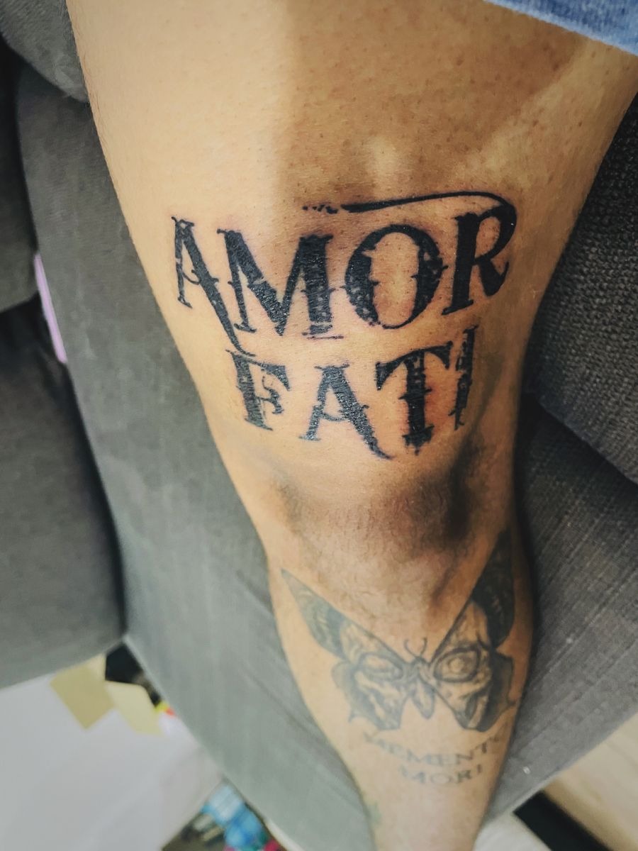 Distressed Bold Amor Fati Lettering Tattoo Design