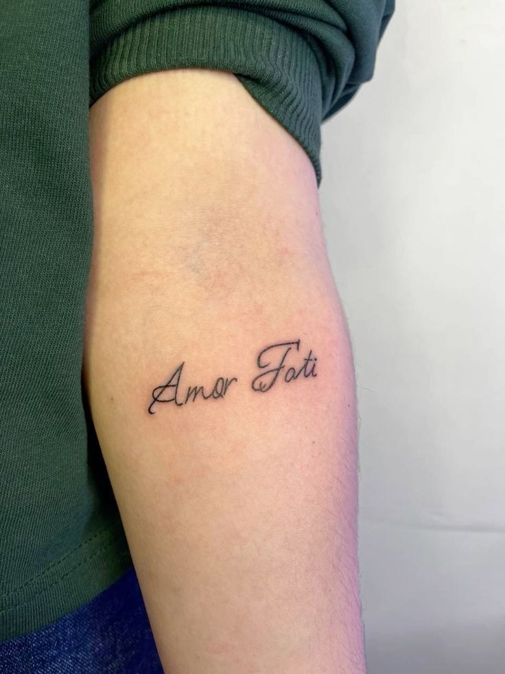 Simple Cursive Amor Fati Upper Arm Tattoo Tattoo Design