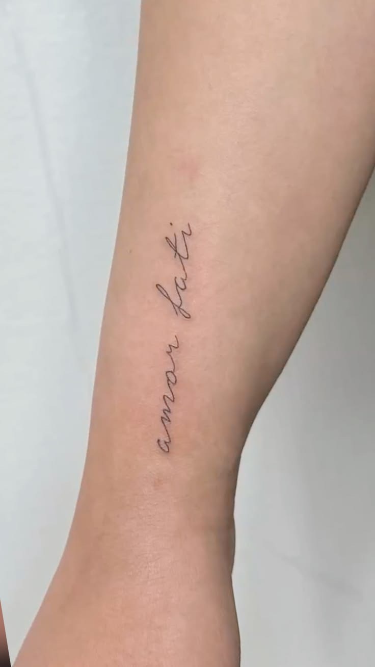 Vertical Fine Line Amor Fati Tattoo Tattoo Design