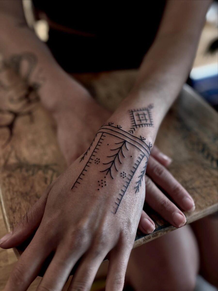 Elegant blend of geometry and nature in tattoos Tattoo Design