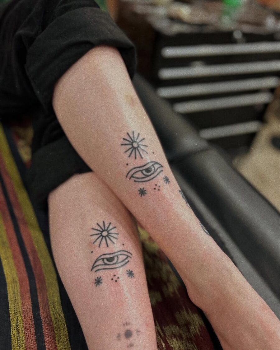 Intricate floral tattoos adorning the thighs Tattoo Design