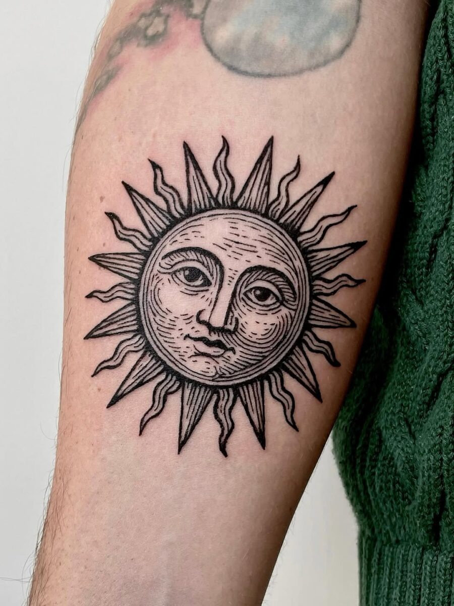 Intricate sun tattoo with classic vintage flair Tattoo Design