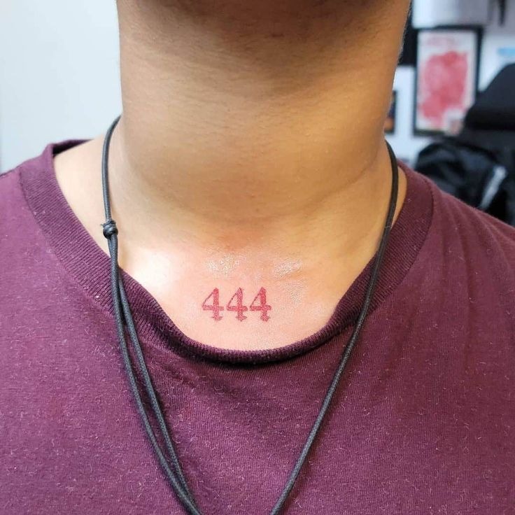 This red 444 tattoo placed at the top of the chest is all about heart-centered meaning.