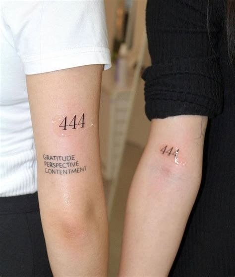 These sleek 444 tattoos shine on the inner arm, right above the elbow crease.