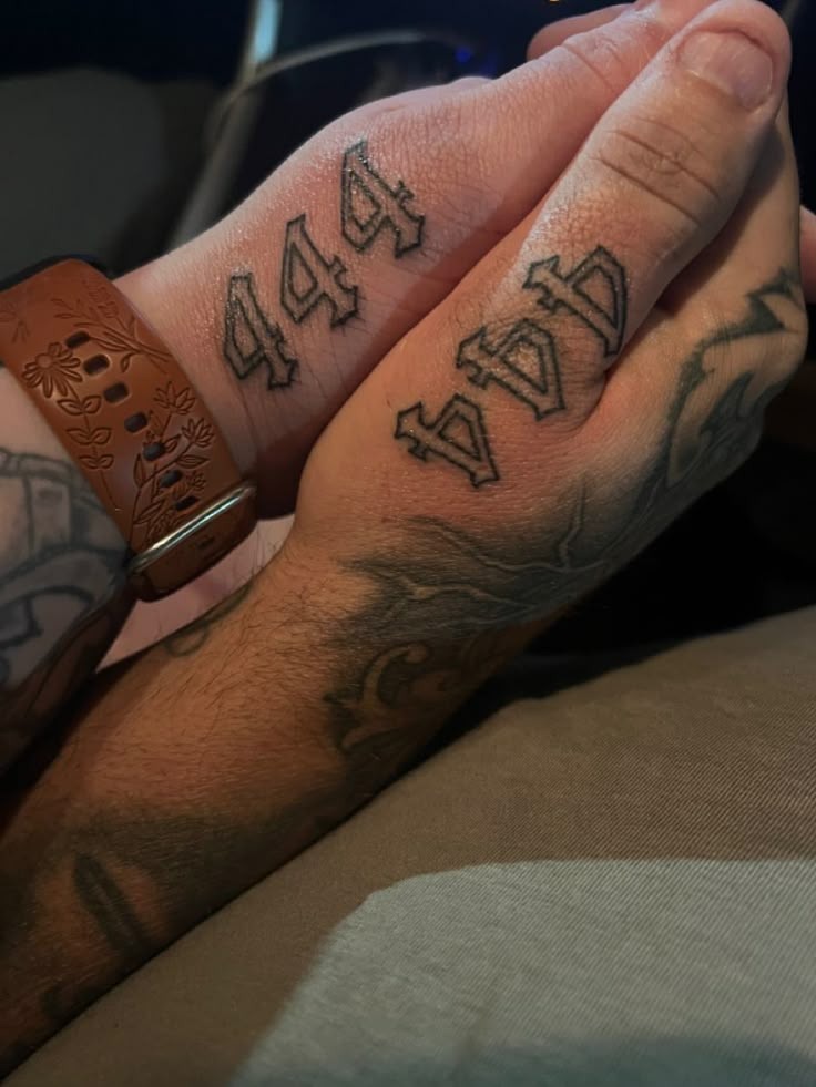 These 444 tattoos for couples are inked on the hand, bold and facing outward, an intentional declaration of connection.
